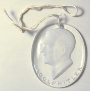 Glass Hitler Medal from the 20 piece "Famous Germans" set (see below).  36 mm tall by 30 mm wide. 